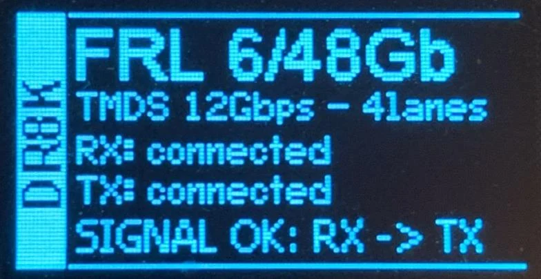 DR HDMI 8K OLED default information page showing the active FRL rate, the TMDS clock and the RX and TX connection status